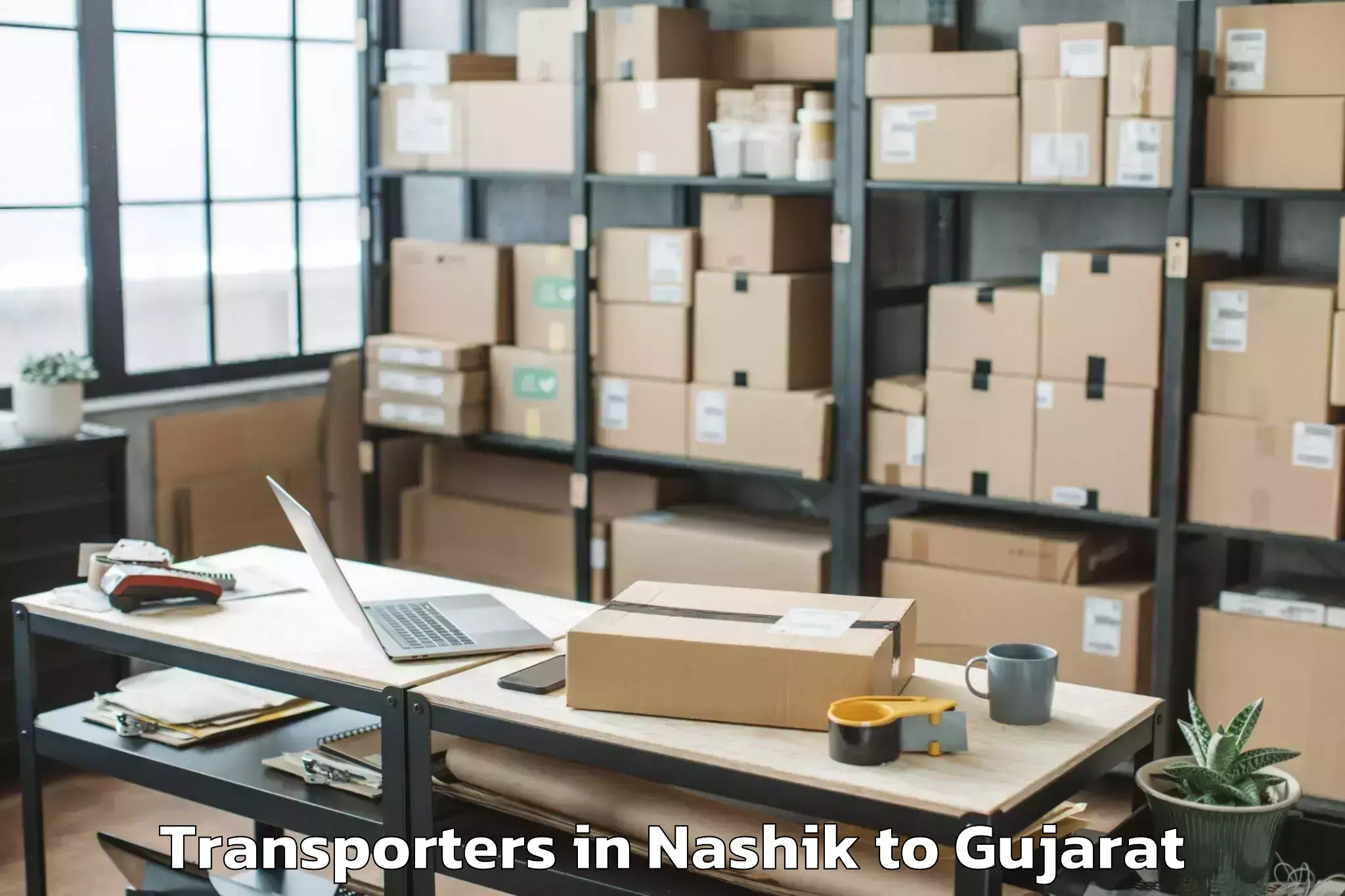 Leading Nashik to Veer Narmad South Gujarat Univ Transporters Provider